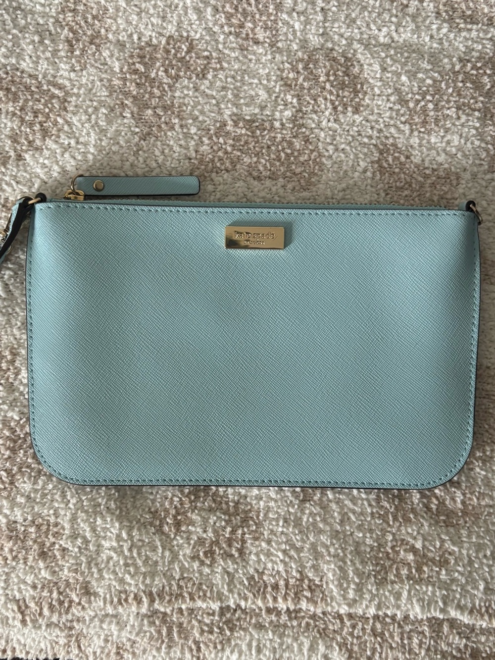 kate spade light aqua leather wristlet with gold-tone logo